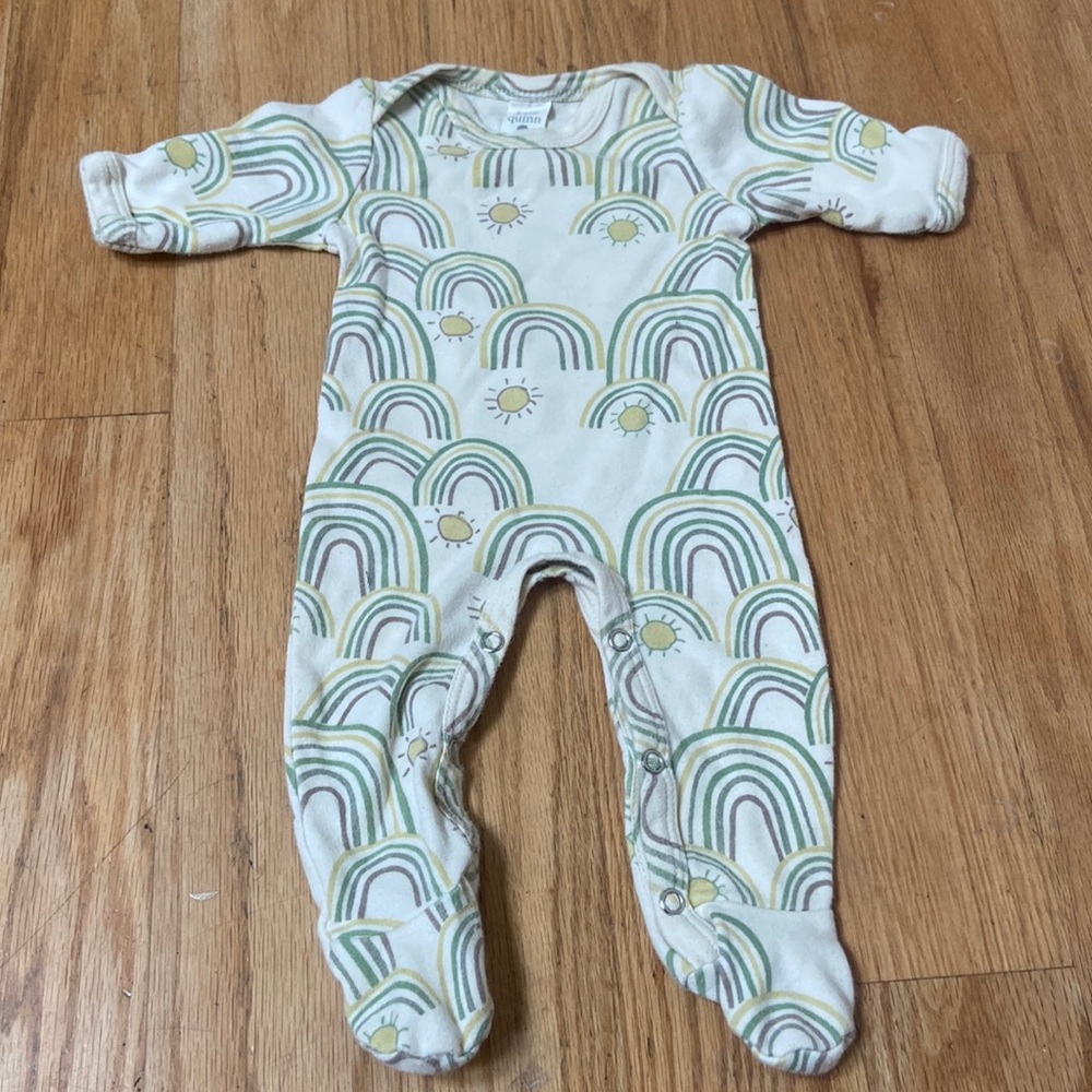 Kate Quinn newborn rainbow footie